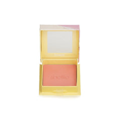 Benefit Shellie applied on model cheeks showing natural rosy glow benefit