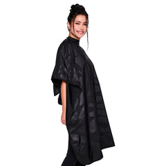 Betty Dain bleach-proof cape worn during color service with stain-free results.