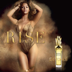 Beyoncé Rise wearer on pulse points suggesting daily ritual.