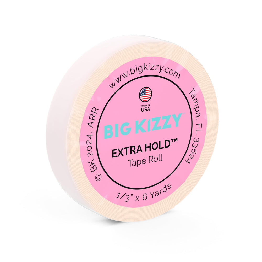 Big Kizzy Extra Hold tape roll closeup highlighting strong, residue-free hold for extensions.
