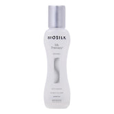 BioSilk Silk Therapy Original bottle pouring for a shine boost and smooth strands.