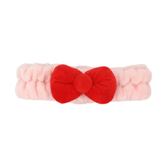 Bioworld Hello Kitty bow towel featuring signature bow for playful decor.