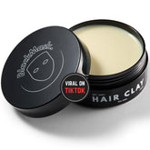 BlackMask Hair Clay bottle shows sleek packaging for easy styling prep.