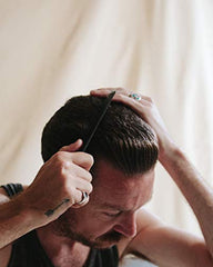Blind Barber hops-infused blend visual emphasizes conditioning and subtle thickening benefits