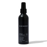 Blind Barber bottle front shows sleek design for easy grip and visibility