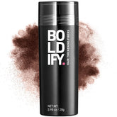 Boldify Hair Fibers 28g bottle close-up showing natural color blend for fuller look.