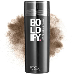 Boldify Hair Fibers bottle dispensing fibers for instant fullness.
