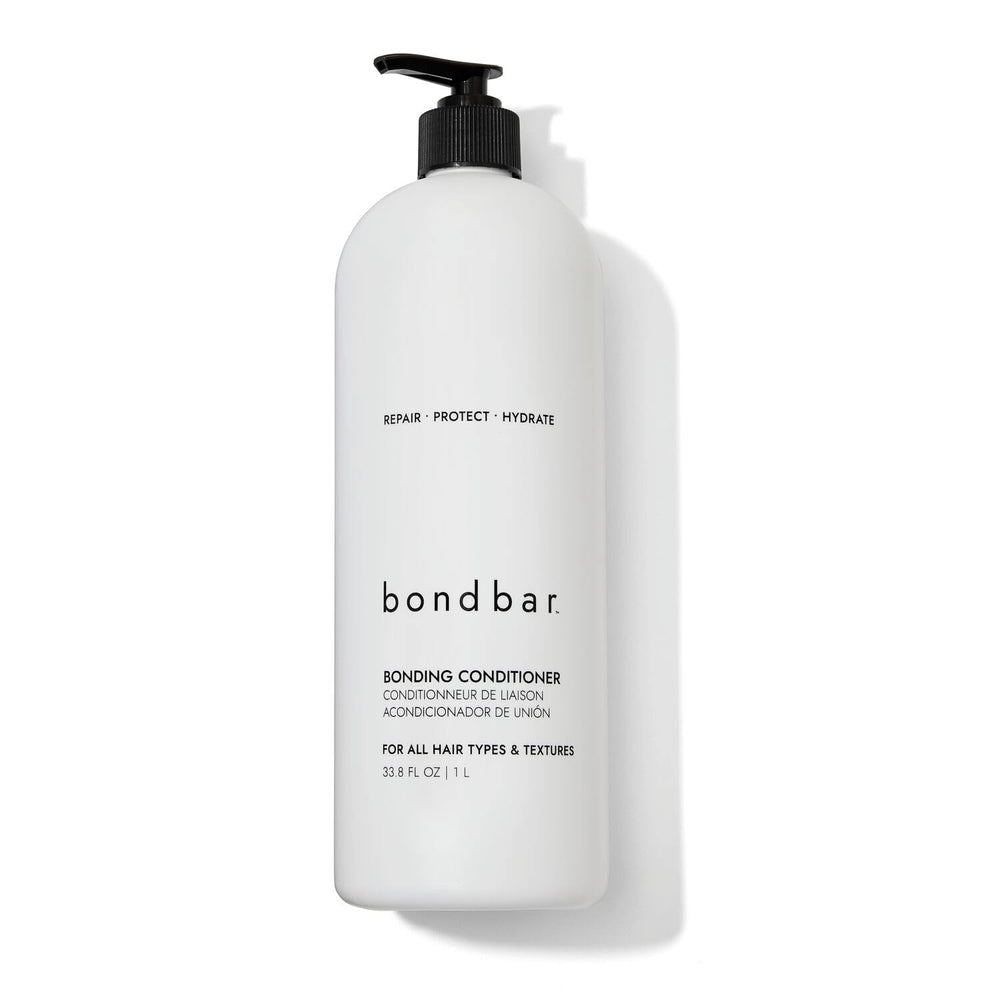 Bondbar conditioner bottle on shelf showcases bond repair and hydration for damaged hair.
