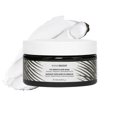BONDIBOOST Miracle Hair Mask bottle pouring for salon-grade hydration and shine.