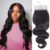 Boopwine 4x4 lace closure body wave 14in with natural parting and volume.