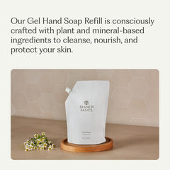 Branch Basics refill pouch pouring into bottle for mess-free, convenient hand soap refills