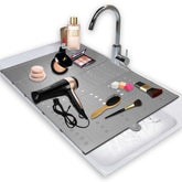 BRIAN & DANY makeup mat sink cover folded gray shows space-saving design for small bathrooms