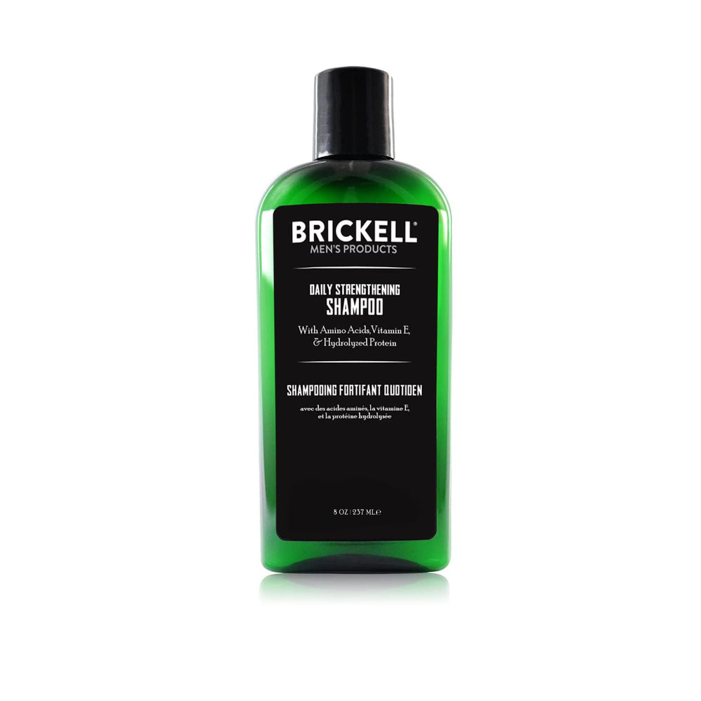 Brickell Daily Strengthening Shampoo bottle pour shows refreshing mint scent and scalp refreshment.