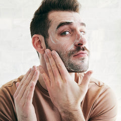 Brickell Men's Purifying Charcoal Face Wash foaming application demonstrates deep-clean without drying