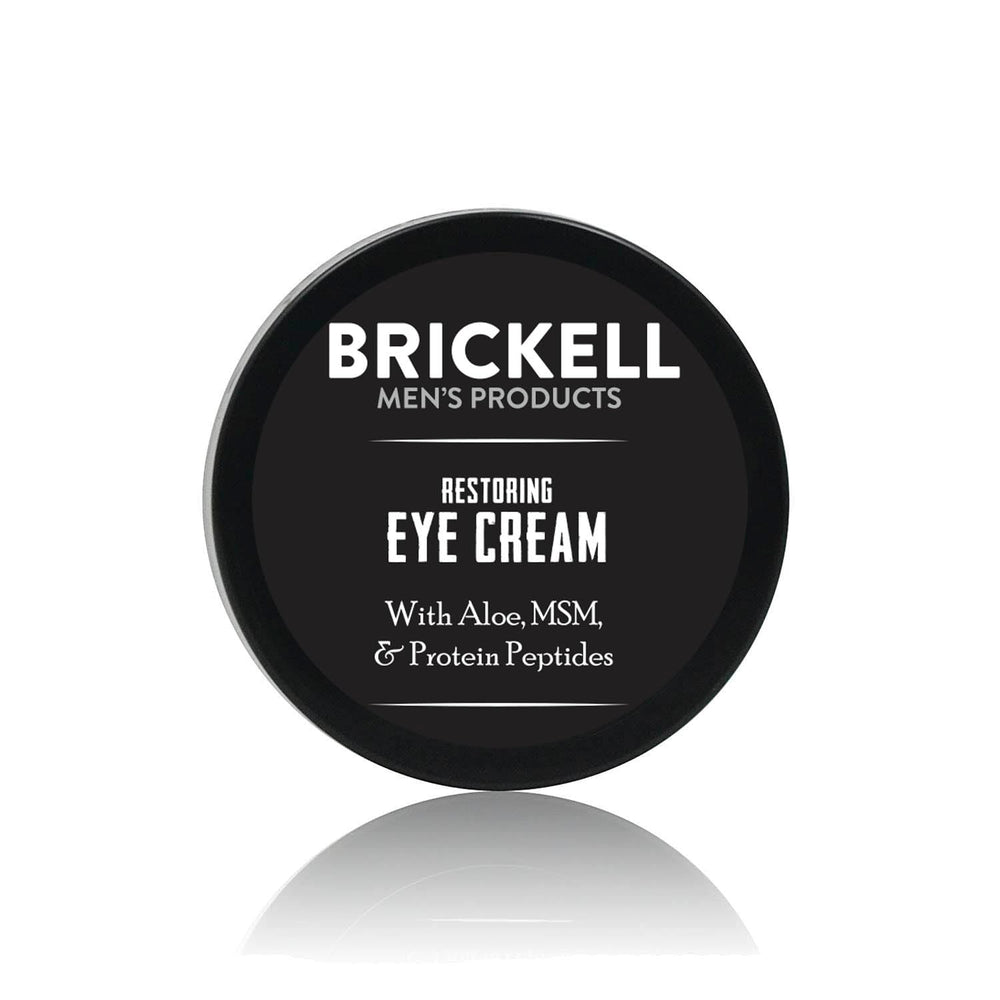 Brickell Men's Restoring Under Eye Cream tube ready for quick, unscented hydration around the eyes.