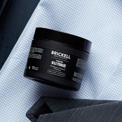 Brickell Men's wax pomade being applied demonstrates quick styling for short to medium hair.