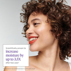 Briogeo Curl Charisma application on hair close-up illustrating usage.