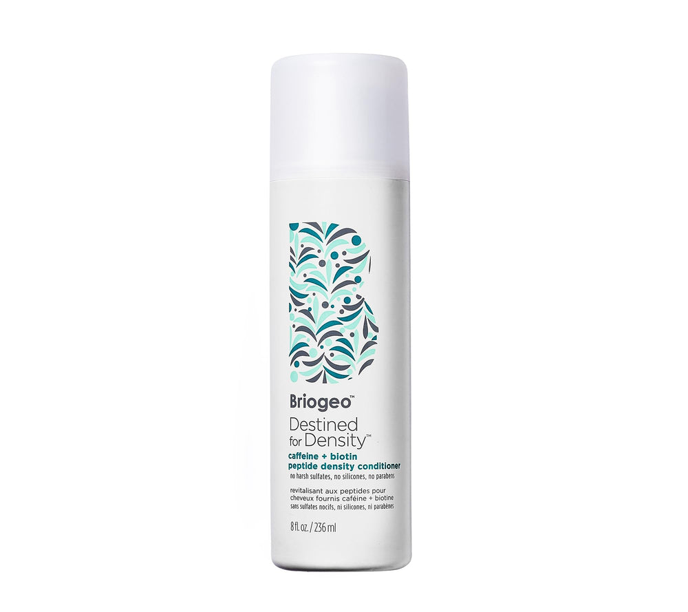 Briogeo Destined For Density bottle closeup showing caffeine peptide formula for fuller-looking hair.
