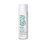 Briogeo Destined For Density bottle closeup showing caffeine peptide formula for fuller-looking hair.