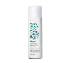 Briogeo Destined For Density bottle closeup showing caffeine peptide formula for fuller-looking hair.