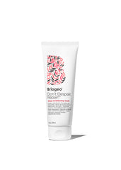 Briogeo Don't Despair, Repair! bottle shows creamy deep-conditioning formula for dry hair repair.