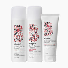 Briogeo Don't Despair Repair mini shampoo closeup showing detoxifying charcoal.