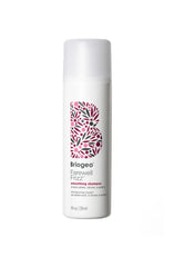 Briogeo Farewell Frizz Shampoo bottle shows frizz control and shine for sleek results.