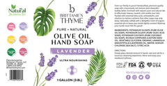 Brittanie's Thyme lavender castile soap beside dishes for versatile kitchen use.