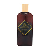 Brown Sugar Babe Island Gyal Body Oil bottle close-up highlights silky hydration.
