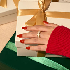 BTArtbox red oval press-on nails application scene showing secure fit.