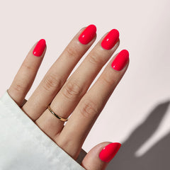 BTArtbox salmon pink short nails close-up with glossy gel finish for natural look