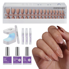BTArtboxnails XCOATTIPS short almond tips close-up, showing natural French-ready nails at home.