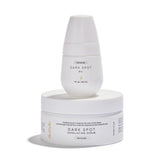 Bushbalm Bermuda dark spots oil bottle demonstrates targeted brightening for uneven skin tone.