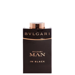 BVLGARI Man in Black spray application close-up for office elegance