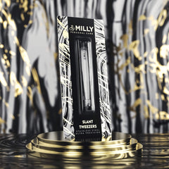 By MILLY high-carbon steel tweezers offer durable performance for long-lasting grooming at home.
