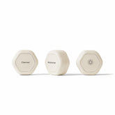 Cadence travel containers with magnetic design for compact, organized skincare on the go.