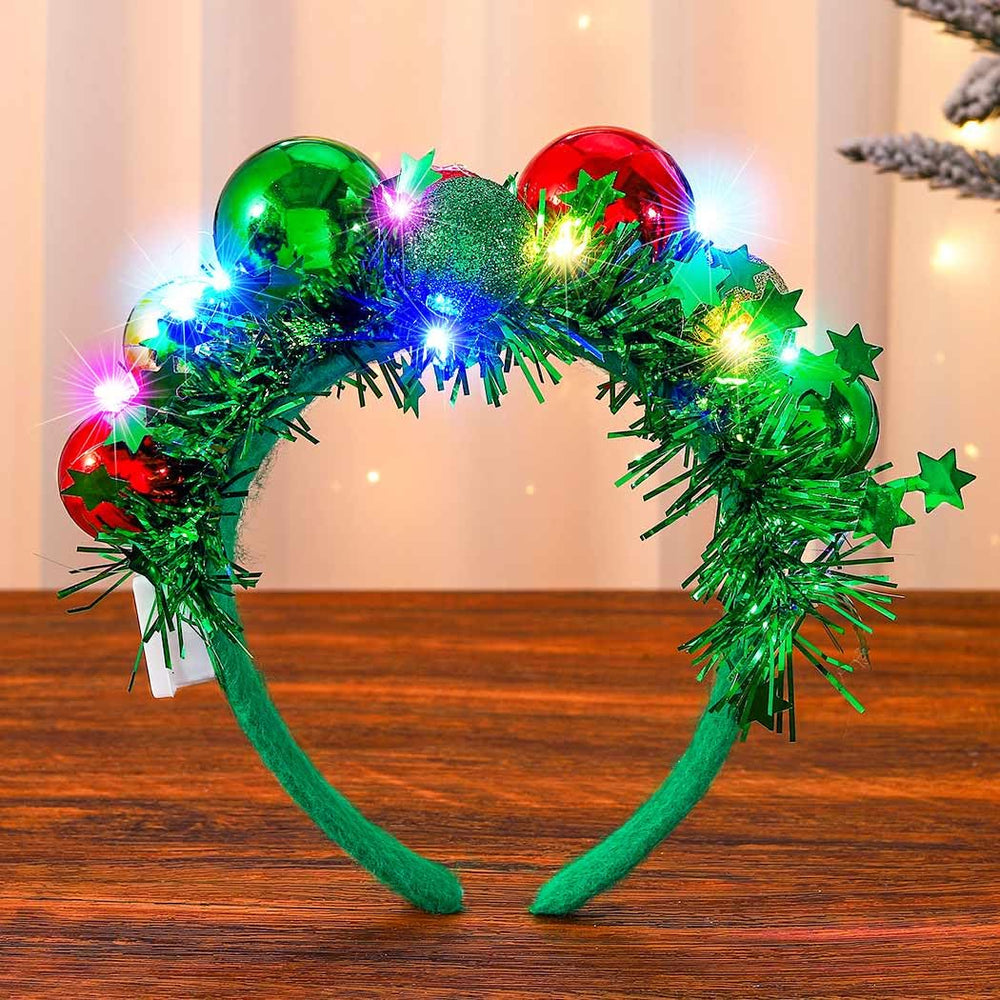 CAKURE LED Christmas headband with green glow for party-ready styling.