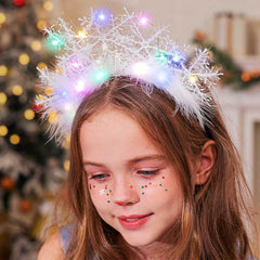 CAKURE light-up snowflake headband showing flexible wearable-fit for comfort