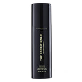 Caldera + Lab conditioner bottle closeup, showcasing hydrating formula for softer, shinier hair.