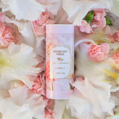 Camille Beckman powder dispensed into hand for easy, controlled application.