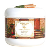 Camille Beckman glycerine hand therapy cream Tuscan Honey label closeup showing nourishing skin.