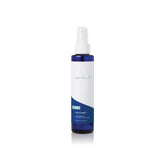 Capri Blue dry body oil spray bottle for fast hydration without greasy residue.