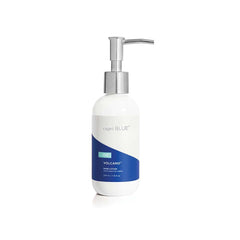 Capri Blue Volcano hand lotion pump bottle on vanity, delivering quick hydration.