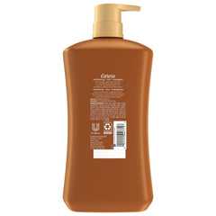 Caress body wash in hand demonstrates moisturizing cleansing for soft skin.