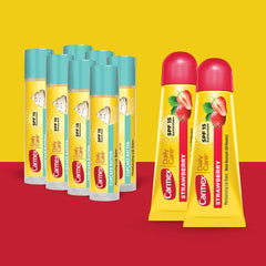 Carmex cupcake batter stick close-up showing smooth glide and flavor.