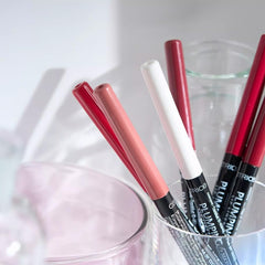 Catrice lip liner with swirl texture demonstrates satin matte finish.