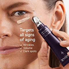 Caudalie Premier Cru eye cream metal applicator glides for depuffing and smoothing.