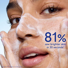 Caudalie Vinoperfect micropeel foam cleanser massage application demonstrates daily cleansing ritual for smoother skin.