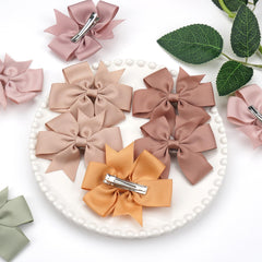 CÉLLOT 70-piece bows set in matching color pairs.