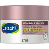Cetaphil Healthy Radiance whipped day cream with SPF 30 on a tube delivering soft hydration